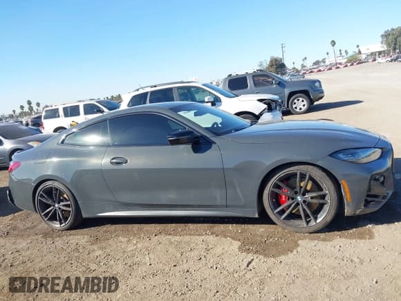 ✅ 2022 BMW 4 Series 430i • VIN: WBA53AP0XNCJ50015 • Lot: 41313087. Listed on IAAI with 70,816 mi. Free auction sales archive from the USA and detailed vehicle history report at DreamBid. Image 13.