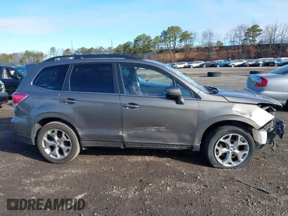 ✅ 2017 Subaru Forester Touring • VIN: JF2SJAWC9HH507636 • Lot: 41801988. Listed on IAAI with 32,030 mi. Free auction sales archive from the USA and detailed vehicle history report at DreamBid. Image 13.