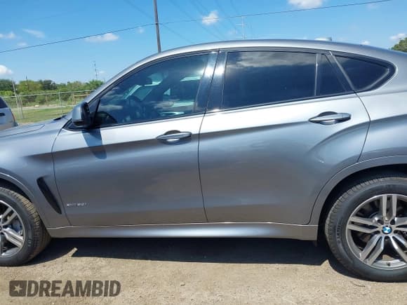 ✅ 2015 BMW X6 xDrive50i • VIN: 5UXKU6C54F0F93945 • Lot: 43042471. Listed on IAAI with 52,434 mi. Free auction sales archive from the USA and detailed vehicle history report at DreamBid. Image 14.