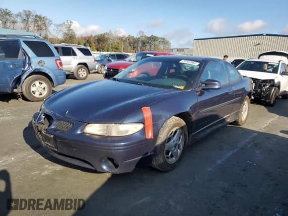 ✅ 2001 Pontiac Grand Prix GT • VIN: 1G2WP12K01F256118 • Lot: 79707064. Listed on Copart with 906,396 mi. Free auction sales archive from the USA and detailed vehicle history report at DreamBid. Image 1.