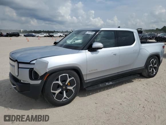 ✅ 2023 Rivian R1T Adventure • VIN: 7FCTGAAA1PN020612 • Lot: 72971044. Wystawiony na Copart z przebiegiem 7 858 mil. Bezpłatny archiwum sprzedaży aukcyjnych z USA i szczegółowy raport historii pojazdu na DreamBid. Zdjęcie 1.