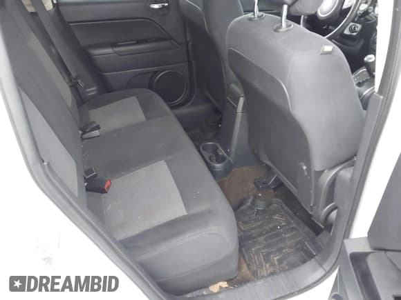 ✅ 2014 Jeep Patriot Latitude • VIN: 1C4NJRFB7ED897883 • Lot: 43846250. Listed on IAAI with 159,065 mi. Free auction sales archive from the USA and detailed vehicle history report at DreamBid. Image 8.
