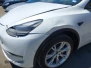 ✅ 2022 Tesla Model Y Long Range • VIN: 7SAYGDEE4NF315356 • Lot: 42895102. Wystawiony na IAAI z przebiegiem 1 057 mil. Bezpłatny archiwum sprzedaży aukcyjnych z USA i szczegółowy raport historii pojazdu na DreamBid. Zdjęcie 6.