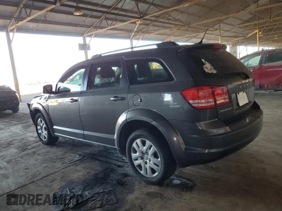 ✅ 2016 Dodge Journey SE • VIN: 3C4PDCAB7GT211794 • Lot: 82312475. Listed on Copart with 217,028 mi. Free auction sales archive from the USA and detailed vehicle history report at DreamBid. Image 2.