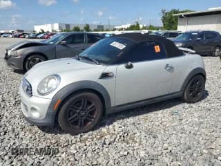 ✅ 2014 MINI Roadster • VIN: WMWSY1C50ET719556 • Lot: 65177525. Wystawiony na Copart z przebiegiem 64 689 mil. Bezpłatny archiwum sprzedaży aukcyjnych z USA i szczegółowy raport historii pojazdu na DreamBid. Zdjęcie 1.