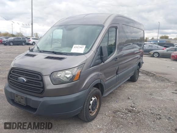 ✅ 2015 Ford Transit Cargo • VIN: 1FTNR2CM1FKB25334 • Lot: 43527517. Listed on IAAI with 178,023 mi. Free auction sales archive from the USA and detailed vehicle history report at DreamBid. Image 2.
