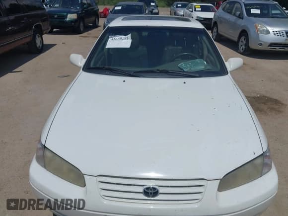 ✅ 1998 Toyota Camry LE • VIN: 4T1BF28K7WU070231 • Lot: 42650252. Listed on IAAI with 258,405 mi. Free auction sales archive from the USA and detailed vehicle history report at DreamBid. Image 6.