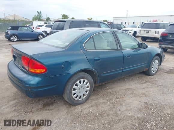 ✅ 2002 Oldsmobile Alero GL1 • VIN: 1G3NL52F42C243372 • Лот: 43116933. Опубликован ранее на IAAI с пробегом 146 980 миль. Бесплатный доступ к архиву аукционных продаж из США и подробный отчёт об истории автомобиля на DreamBid. Изображение 4.