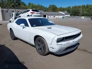 2014 Dodge Challenger SXT with VIN 2C3CDYAG1EH214823, listed as a IAAI auction lot 43327884 with 206,462 mi miles and . Bid and sale history available at DreamBid. Image 1.