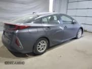 ✅ 2021 Toyota Prius LE • VIN: JTDKAMFPXM3176253 • Lot: 82098695. Listed on Copart with 64,523 mi. Free auction sales archive from the USA and detailed vehicle history report at DreamBid. Image 3.