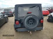 ✅ 2005 Jeep Wrangler Unlimited • VIN: 1J4FA44S25P335120 • Lot: 70306025. Listed on Copart with 137,315 mi. Free auction sales archive from the USA and detailed vehicle history report at DreamBid. Image 6.