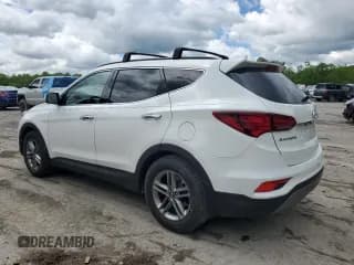 ✅ 2018 Hyundai Santa Fe 2.4L • VIN: 5XYZU3LB0JG535142 • Лот: 54586104. Опубликован ранее на Copart с пробегом 58 661 миль. Бесплатный доступ к архиву аукционных продаж из США и подробный отчёт об истории автомобиля на DreamBid. Изображение 2.