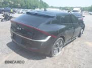 ✅ 2024 Kia EV6 Wind • VIN: KNDC3DLC2R5217910 • Лот: 42309547. Опубликован ранее на IAAI с пробегом 14 501 миль. Бесплатный доступ к архиву аукционных продаж из США и подробный отчёт об истории автомобиля на DreamBid. Изображение 4.