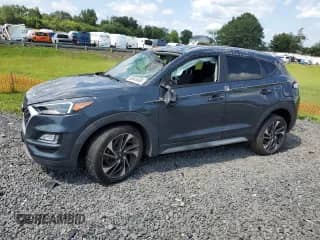 2021 Hyundai Tucson Ultimate с VIN KM8J33AL7MU385346, выставлен на аукционе Copart как лот 66446495 с пробегом 56 886 миль миль и Списание • Salvage title. История ставок и продаж доступна на DreamBid. Изображение 1.