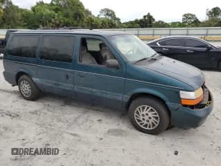 ✅ 1995 Dodge Caravan Grand SE • VIN: 1B4GH44R8SX633988 • Lot: 65667454. Listed on Copart with 121,183 mi. Free auction sales archive from the USA and detailed vehicle history report at DreamBid. Image 4.