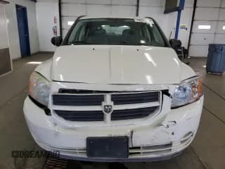 ✅ 2007 Dodge Caliber • VIN: 1B3HB28B57D269985 • Лот: 79621214. Опубликован ранее на Copart с пробегом 135 719 миль. Бесплатный доступ к архиву аукционных продаж из США и подробный отчёт об истории автомобиля на DreamBid. Изображение 5.