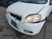 ✅ 2010 Chevrolet Aveo 1LT • VIN: KL1TD5DE0AB089005 • Lot: 41493818. Wystawiony na IAAI z przebiegiem 130 015 mil. Bezpłatny archiwum sprzedaży aukcyjnych z USA i szczegółowy raport historii pojazdu na DreamBid. Zdjęcie 6.