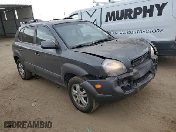 2007 Hyundai Tucson SE with VIN KM8JN72D57U518473, listed as a Copart auction lot 71998814 with 106,340 mi miles and Salvage title. Bid and sale history available at DreamBid. Image 4.