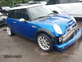 ✅ 2006 MINI Hardtop S • VIN: WMWRE33596TN25810 • Lot: 42664250. Listed on IAAI with 167,336 mi. Free auction sales archive from the USA and detailed vehicle history report at DreamBid. Image 1.