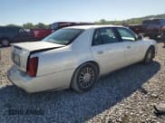 ✅ 2003 Cadillac DeVille DHS • VIN: 1G6KE54YX3U190879 • Lot: 57874555. Listed on Copart with 180,129 mi. Free auction sales archive from the USA and detailed vehicle history report at DreamBid. Image 3.