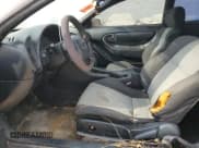 ✅ 1994 Toyota Celica ST • VIN: JT2AT00F9R0023167 • Lot: 76738244. Wystawiony na Copart z przebiegiem 220 210 mil. Bezpłatny archiwum sprzedaży aukcyjnych z USA i szczegółowy raport historii pojazdu na DreamBid. Zdjęcie 7.