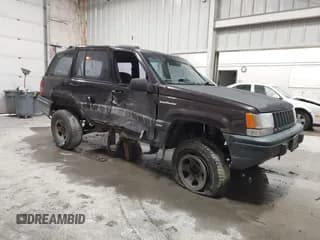✅ 1993 Jeep Grand Cherokee • VIN: 1J4GZ68S6PC579995 • Lot: 43282637. Listed on IAAI with 172,681 mi. Free auction sales archive from the USA and detailed vehicle history report at DreamBid. Image 1.
