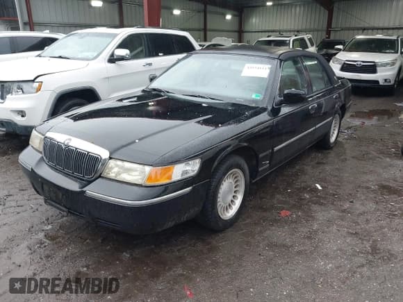 ✅ 2002 Mercury Grand Marquis LS Premium • VIN: 2MEFM75W52X610953 • Лот: 43574111. Опубликован ранее на IAAI с пробегом 150 665 миль. Бесплатный доступ к архиву аукционных продаж из США и подробный отчёт об истории автомобиля на DreamBid. Изображение 2.