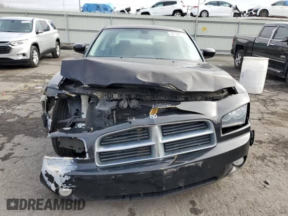 2010 Dodge Charger SXT с VIN 2B3CA3CV7AH156084, выставлен на аукционе Copart как лот 81144174 с пробегом 144 636 миль миль и Списание • Salvage title. История ставок и продаж доступна на DreamBid. Изображение 5.
