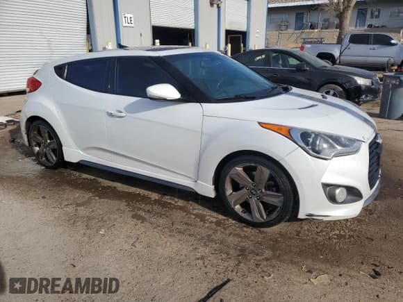 ✅ 2015 Hyundai Veloster Turbo • VIN: KMHTC6AE5FU243883 • Lot: 87482514. Wystawiony na Copart z przebiegiem 159 499 mil. Bezpłatny archiwum sprzedaży aukcyjnych z USA i szczegółowy raport historii pojazdu na DreamBid. Zdjęcie 4.