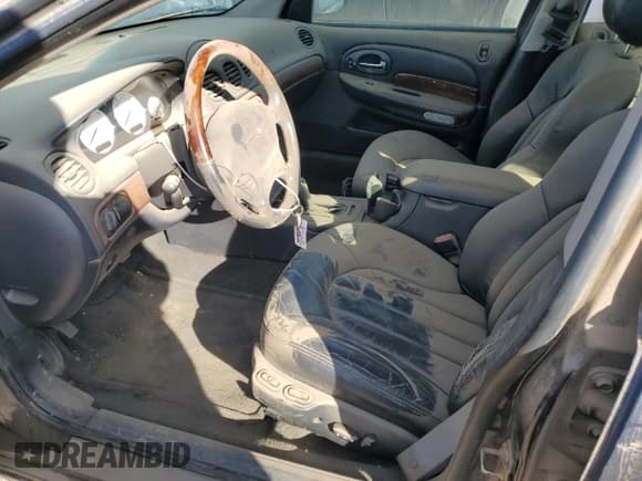 ✅ 2001 Chrysler 300M M • VIN: 2C3HE66G01H557911 • Lot: 78632764. Listed on Copart with 135,174 mi. Free auction sales archive from the USA and detailed vehicle history report at DreamBid. Image 7.