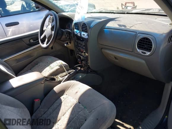 ✅ 2003 GMC Envoy SLE • VIN: 1GKDS13S732134354 • Lot: 41305506. Listed on IAAI with 221,733 mi. Free auction sales archive from the USA and detailed vehicle history report at DreamBid. Image 5.