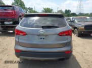 ✅ 2015 Hyundai Santa Fe • VIN: 5XYZUDLB5FG273437 • Лот: 42580624. Опубликован ранее на IAAI с пробегом 92 061 миль. Бесплатный доступ к архиву аукционных продаж из США и подробный отчёт об истории автомобиля на DreamBid. Изображение 16.
