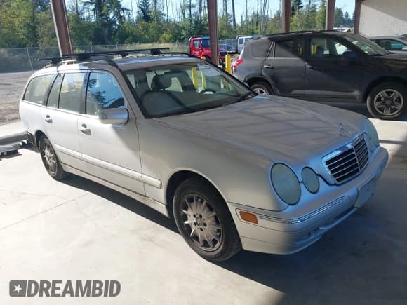 ✅ 2001 Mercedes-Benz E 320 • VIN: WDBJH65J51B340718 • Lot: 42666609. Listed on IAAI with 166,444 mi. Free auction sales archive from the USA and detailed vehicle history report at DreamBid. Image 1.