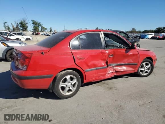 2004 Hyundai Elantra GLS z VIN KMHDN46D24U752362, wystawiony jako Copart lot #81528944 z przebiegiem 157 830 mil mil oraz Szkoda całkowita • Salvage title. Historia ofert i sprzedaży dostępna na DreamBid. Obrazek 3.