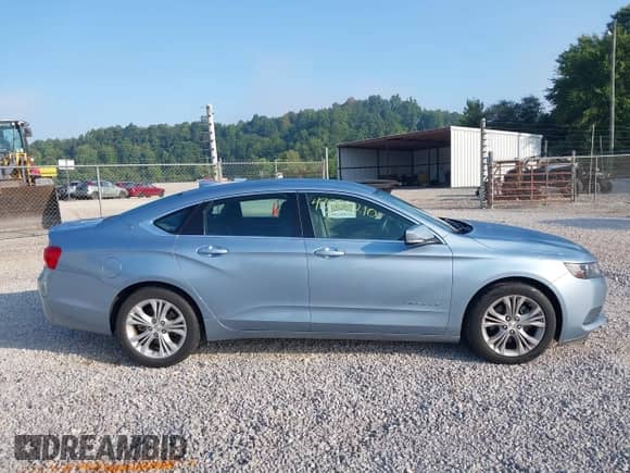 2015 Chevrolet Impala LT with VIN 1G1125S36FU100682, listed as a IAAI auction lot 43003210 with 76,563 mi miles and . Bid and sale history available at DreamBid. Image 14.