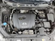 ✅ 2016 Mazda CX-5 Touring • VIN: JM3KE2CY4G0621346 • Лот: 53923615. Опубликован ранее на Copart с пробегом Не указан. Бесплатный доступ к архиву аукционных продаж из США и подробный отчёт об истории автомобиля на DreamBid. Изображение 11.