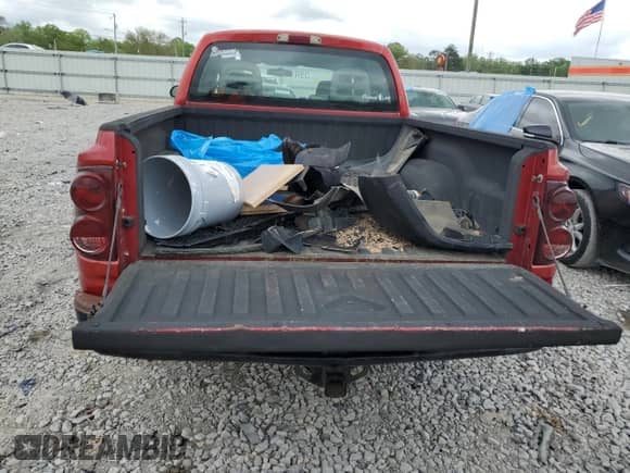 2006 Dodge Dakota ST z VIN 1D7HE28K66S509857, wystawiony jako Copart lot #63910594 z przebiegiem 216 921 mil mil oraz Szkoda całkowita • Salvage title. Historia ofert i sprzedaży dostępna na DreamBid. Obrazek 6.