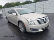 ✅ 2013 Cadillac XTS • VIN: 2G61N5S33D9222783 • Lot: 42917270. Wystawiony na IAAI z przebiegiem 134 654 mil. Bezpłatny archiwum sprzedaży aukcyjnych z USA i szczegółowy raport historii pojazdu na DreamBid. Zdjęcie 1.