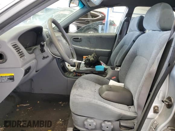 ✅ 2003 Kia Optima LX • VIN: KNAGD126335211255 • Лот: 60637665. Опубликован ранее на Copart с пробегом Не указан. Бесплатный доступ к архиву аукционных продаж из США и подробный отчёт об истории автомобиля на DreamBid. Изображение 7.