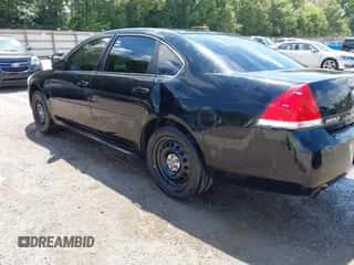 2013 Chevrolet Impala Police with VIN 2G1WD5E35D1106638, listed as a IAAI auction lot 42791624 with 198,805 mi miles and . Bid and sale history available at DreamBid. Image 3.