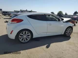 2013 Hyundai Veloster w/Black Int с VIN KMHTC6AD4DU147327, выставлен на аукционе Copart как лот 70406034 с пробегом 121 381 миль миль и Списание • Salvage title. История ставок и продаж доступна на DreamBid. Изображение 3.