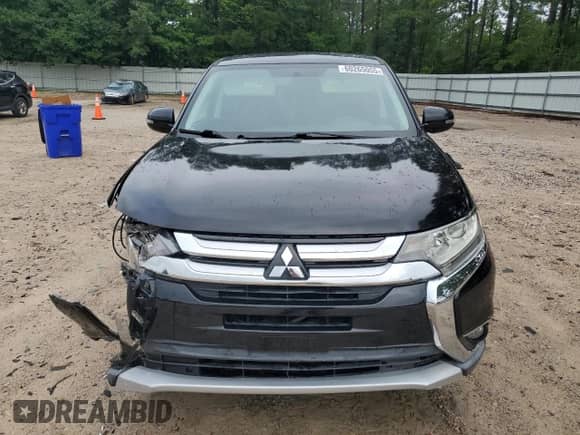 2018 Mitsubishi Outlander ES z VIN JA4AZ3A3XJZ013172, wystawiony jako Copart lot #60265055 z przebiegiem 137 660 mil mil oraz Szkoda całkowita • Salvage title. Historia ofert i sprzedaży dostępna na DreamBid. Obrazek 5.