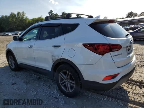 ✅ 2018 Hyundai Santa Fe 2.4L • VIN: 5XYZUDLB0JG570897 • Lot: 68774123. Wystawiony na Copart z przebiegiem 83 988 mil. Bezpłatny archiwum sprzedaży aukcyjnych z USA i szczegółowy raport historii pojazdu na DreamBid. Zdjęcie 2.