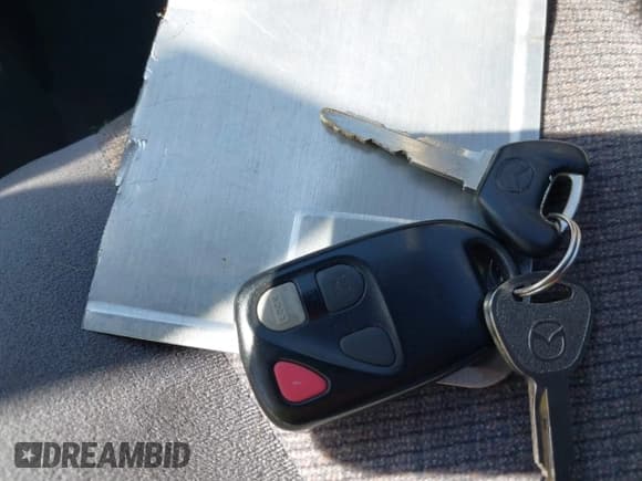 ✅ 2000 Mazda Protege ES • VIN: JM1BJ2211Y0238359 • Lot: 42368475. Listed on IAAI with 80,554 mi. Free auction sales archive from the USA and detailed vehicle history report at DreamBid. Image 11.