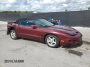 ✅ 2002 Pontiac Firebird Firebird • VIN: 2G2FS32K522122668 • Lot: 89856255. Listed on Copart with 149,243 mi. Free auction sales archive from the USA and detailed vehicle history report at DreamBid. Image 4.