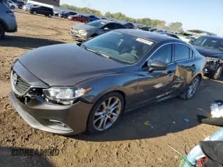 ✅ 2015 Mazda 6 i Grand Touring • VIN: JM1GJ1W51F1193623 • Lot: 84023575. Listed on Copart with 124,822 mi. Free auction sales archive from the USA and detailed vehicle history report at DreamBid. Image 1.