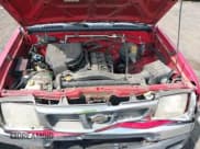 ✅ 2000 Nissan Frontier XE • VIN: 1N6DD26S0YC395959 • Lot: 42055294. Wystawiony na IAAI z przebiegiem 209 982 mil. Bezpłatny archiwum sprzedaży aukcyjnych z USA i szczegółowy raport historii pojazdu na DreamBid. Zdjęcie 10.