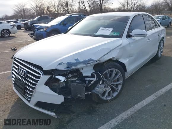 ✅ 2013 Audi A8 3.0L • VIN: WAUAGAFD3DN002332 • Lot: 41618010. Listed on IAAI with 128,309 mi. Free auction sales archive from the USA and detailed vehicle history report at DreamBid. Image 2.
