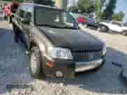 2006 Mercury Mariner Luxury with VIN 4M2YU56176KJ14458, listed as a Copart auction lot 80612095 with 71,488 mi miles and Clean title. Bid and sale history available at DreamBid. Image 14.