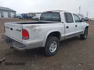 ✅ 2002 Dodge Dakota SLT • VIN: 1B7HG48N72S577296 • Lot: 41848637. Wystawiony na IAAI z przebiegiem 133 777 mil. Bezpłatny archiwum sprzedaży aukcyjnych z USA i szczegółowy raport historii pojazdu na DreamBid. Zdjęcie 4.